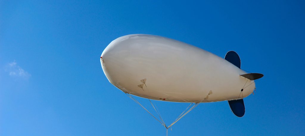 Blimps Floating over Blue Sky Cell tower replaced by blimps